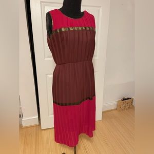 burgundy and magenta pleated dress with gold detail